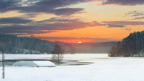 Sunset on winter dam in Rimov on river Malse photo