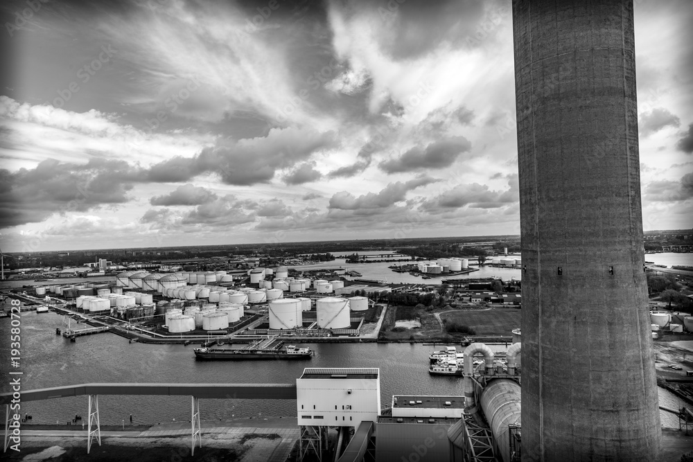 Oil silos in an industrial landscape