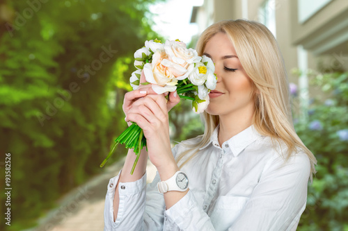 Beautiful young women with flowers