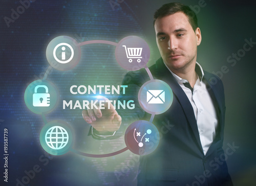 Business, Technology, Internet and network concept. Young businessman working on a virtual screen of the future and sees the inscription: Content marketing