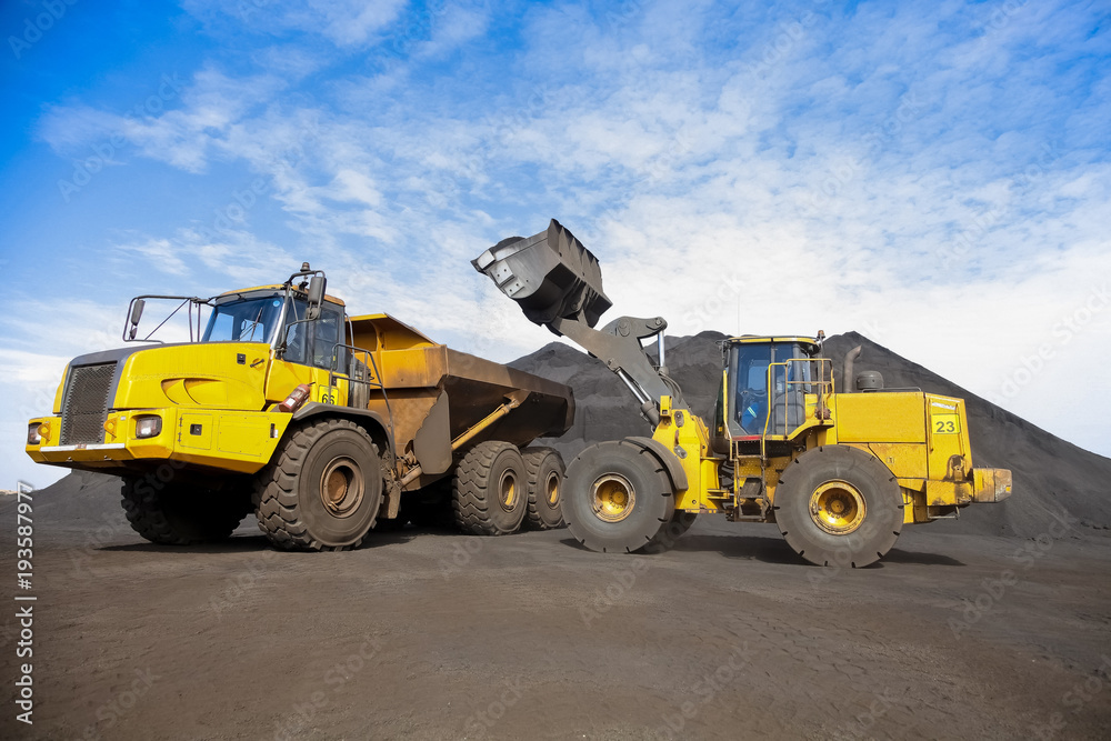 Mining Dump Truck and wheel loader for transporting Manganese for processing