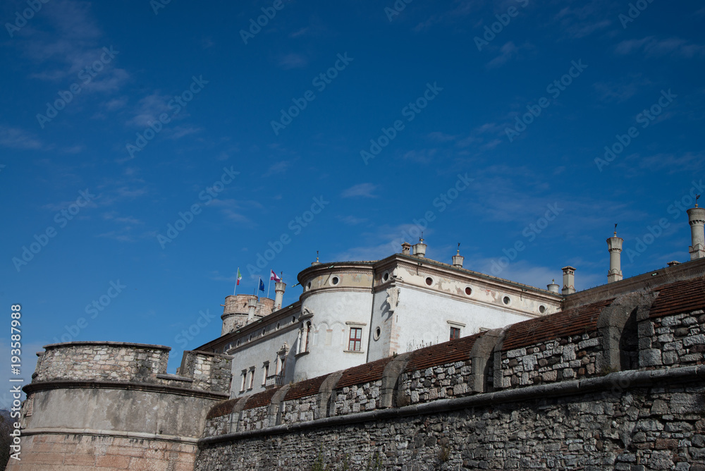 The castle originated from a fortified building that was erected in the 13th century next to the city's walls.