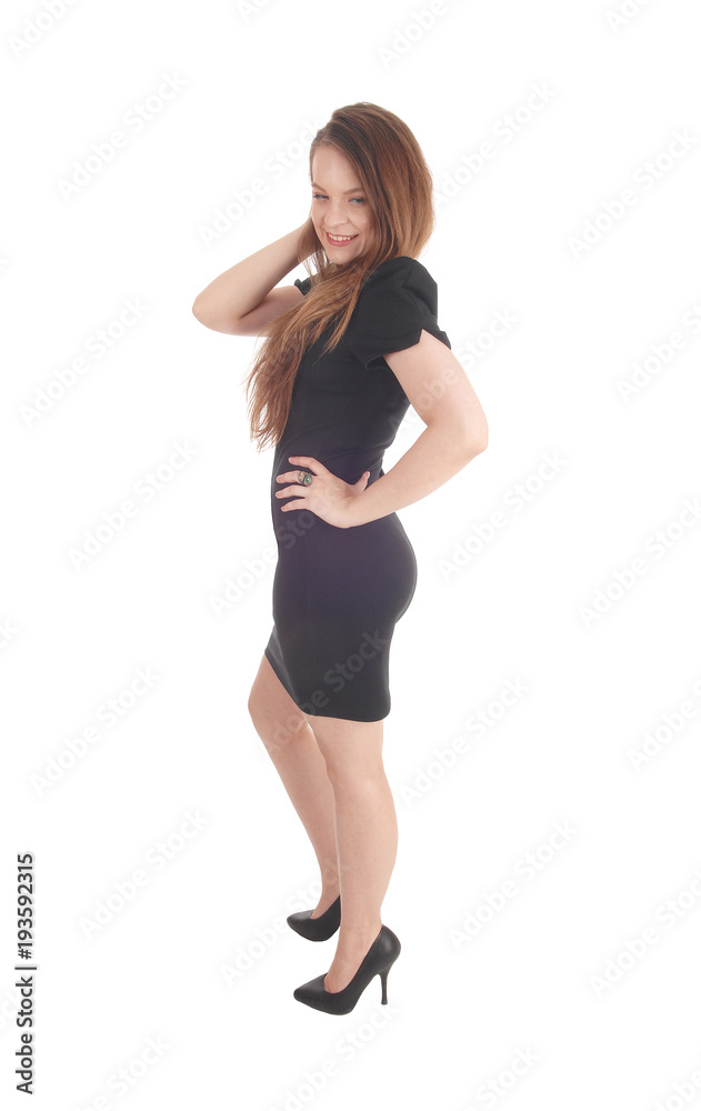 Beautiful brunette woman in a black dress Beautiful brunette woman in a black dress