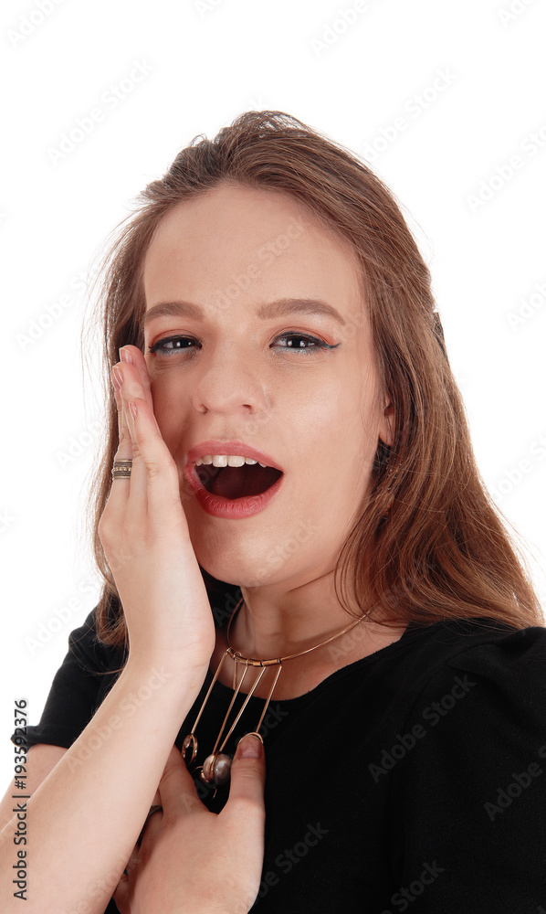 Woman talking behind her hand Woman talking behind her hand