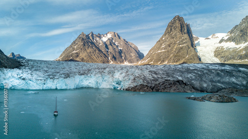 Yacht  glacier and mountain. Powerfull of nature.