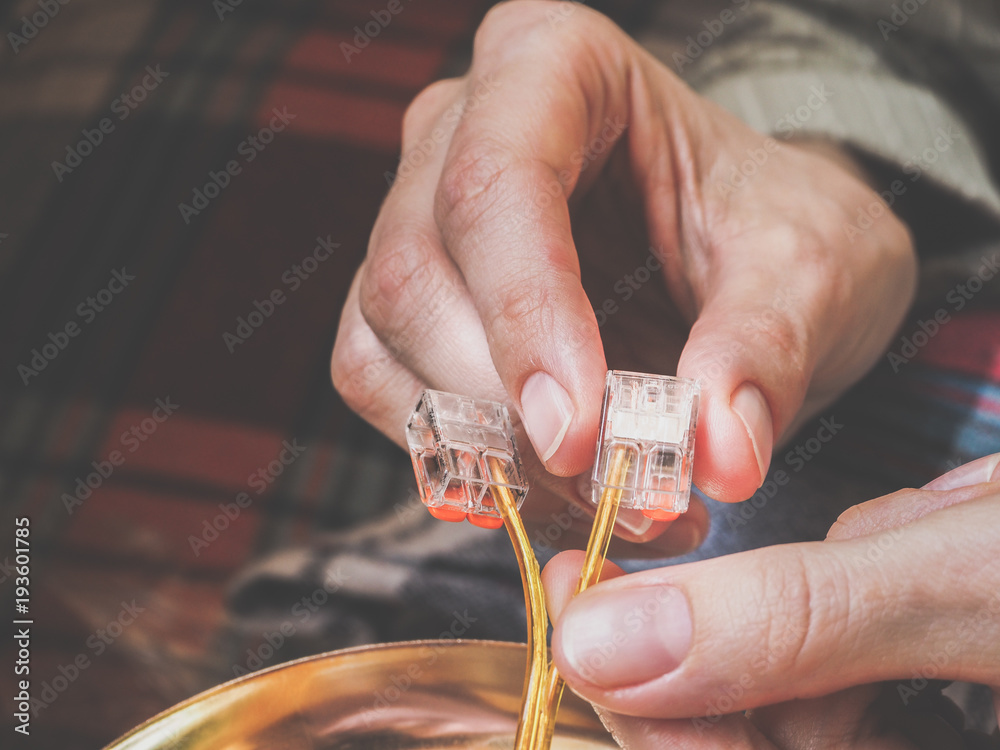 Fototapeta premium Electrician connecting wires 