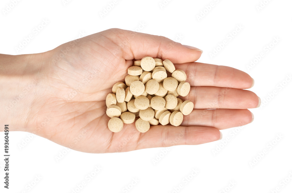 Pills isolated on white background. Vitamins for animals. Pills isolated on white background. Vitamins for animals.