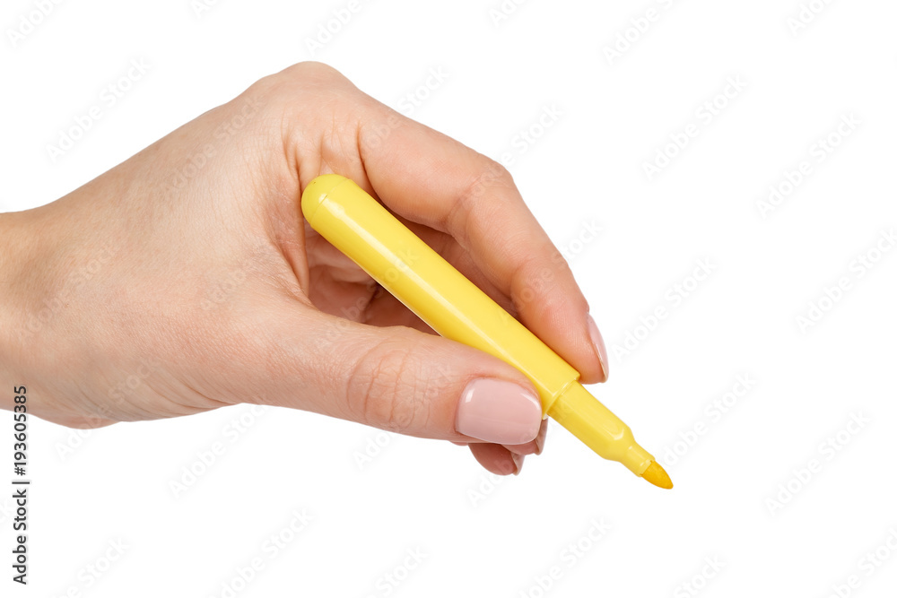Side view of hand writing with a marker. Isolated on white background Side view of hand writing with a marker. Isolated on white background