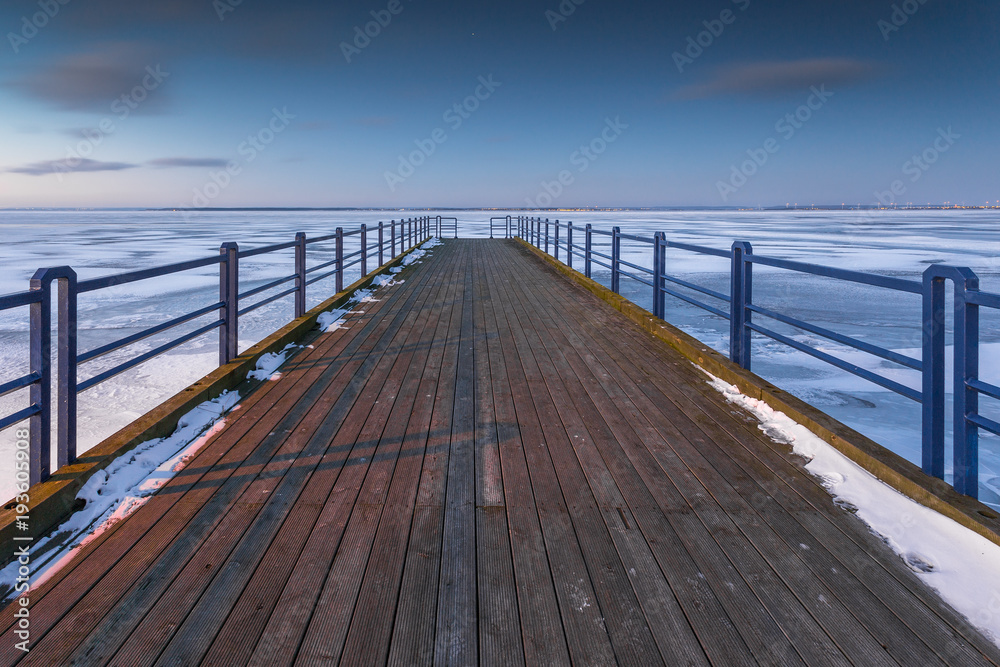 Pier in Chalupy village in Poland in winter season.
