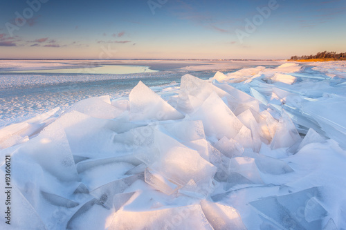 Ice floe on the beach in the village of Chalupy in the Poland.