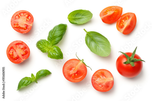 Tomatoes and Basil Leaves Isolated on White Background photo