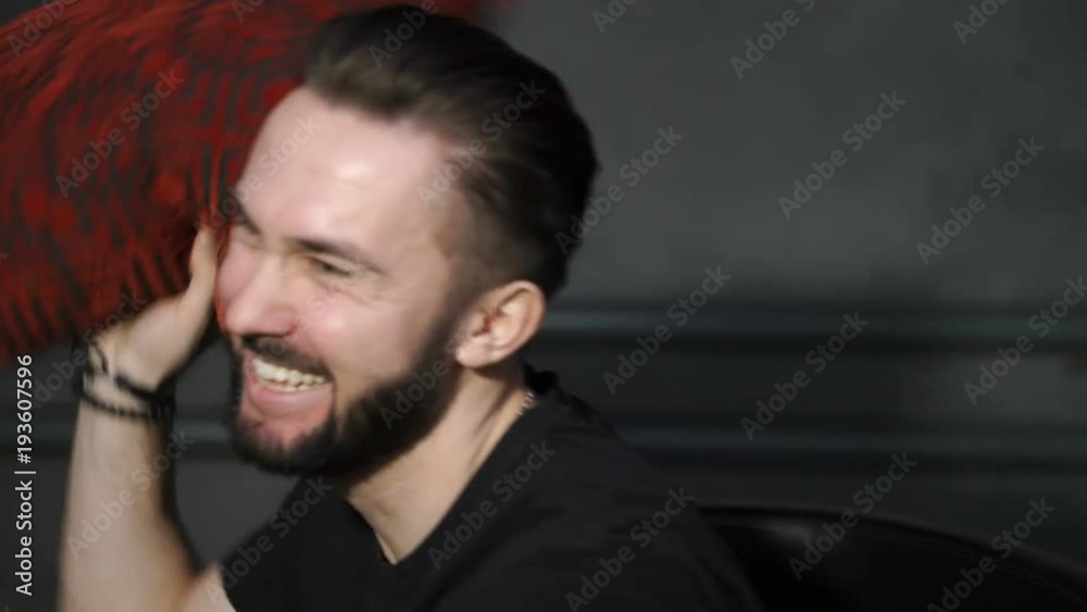 Cheerful man with beard is laughing Cheerful man with beard is laughing