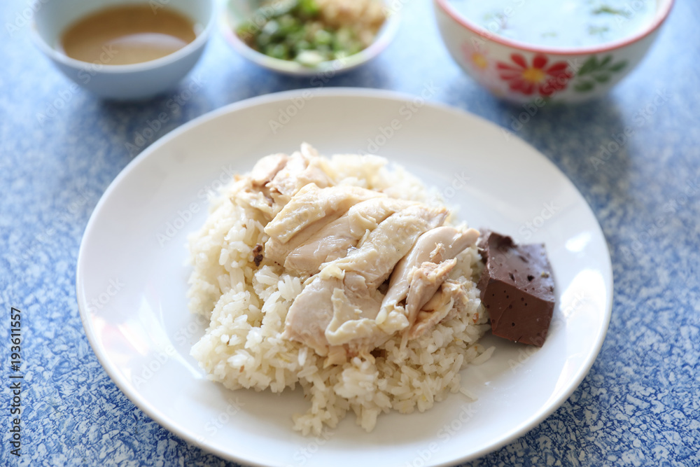 Hainanese chicken rice with cucumber in closeup , Thai food
