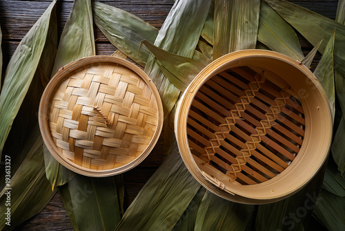 Asian kitchen bamboo steamer for steam cooking photo