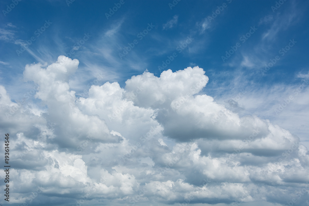 Blue sky with a cloud close-up. Background. Blue sky with a cloud close-up. Background.