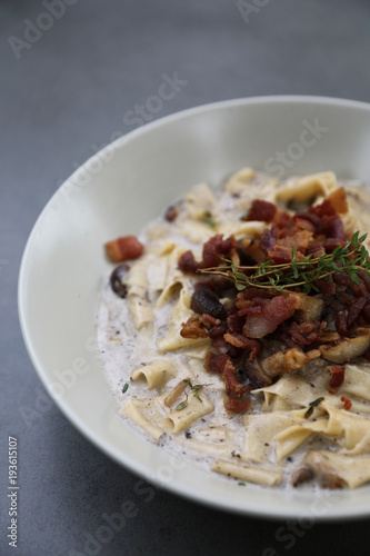 pasta fettuccine alfredo white sauce with ham bacon and mushroom