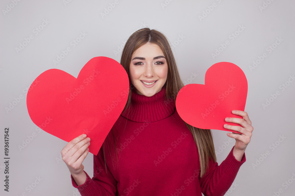beautiful young girl holding a paper hearts beautiful young girl holding a paper hearts