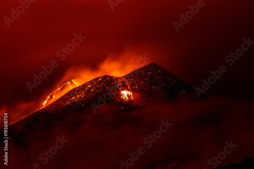 Volcano eruption landscape at night - Mount Etna in Sicily