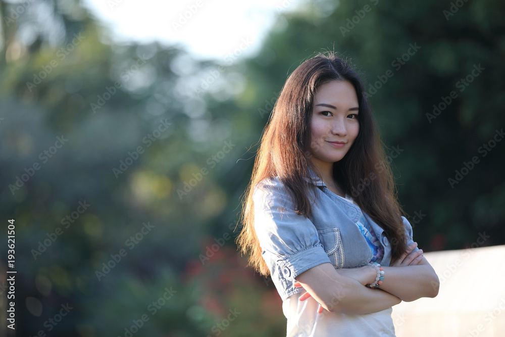 Portrait asian woman with our door park nature background Portrait asian woman with our door park nature background