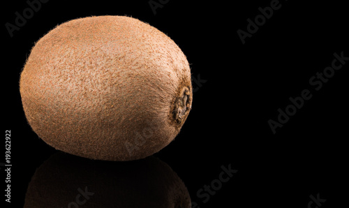 Fresh kiwi isolated on a black background. Closeup photo