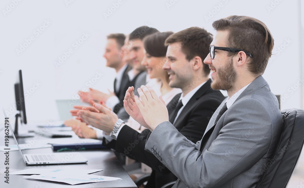 staff applauded the speaker at the meeting staff applauded the speaker at the meeting