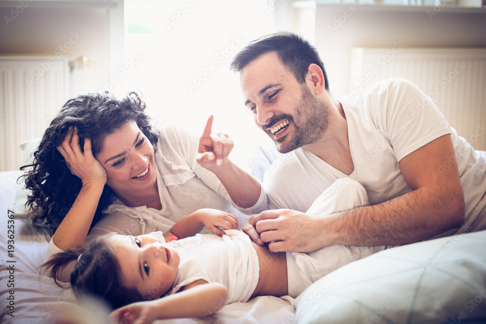 Happy family playing at morning. Happy family playing at morning.