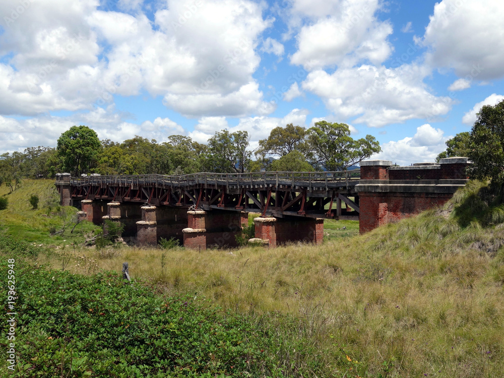 An dilapidated old railway bridge in northern rural New South Wales, Australia An dilapidated old railway bridge in northern rural New South Wales, Australia