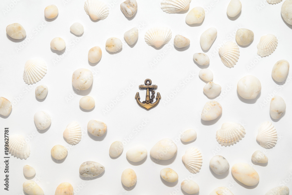 Marine decorative background of small pebbles and shells