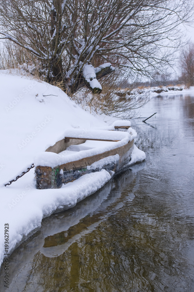 custom made wallpaper toronto digitalWood boat covered with snow on shore of winter river