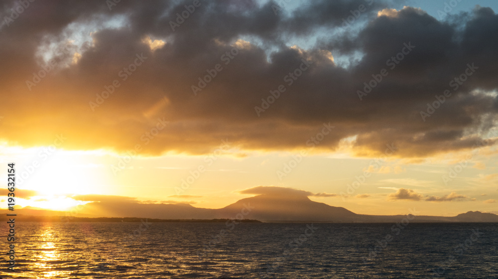 A bright sunset near Mount Isabel de Torres in Puerto Plata. The photo was taken from Sosùa, Dominican Republic.