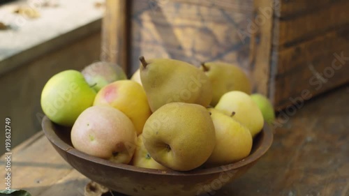 Wallpaper Mural Bowl of fruits on wooden table, close up Torontodigital.ca