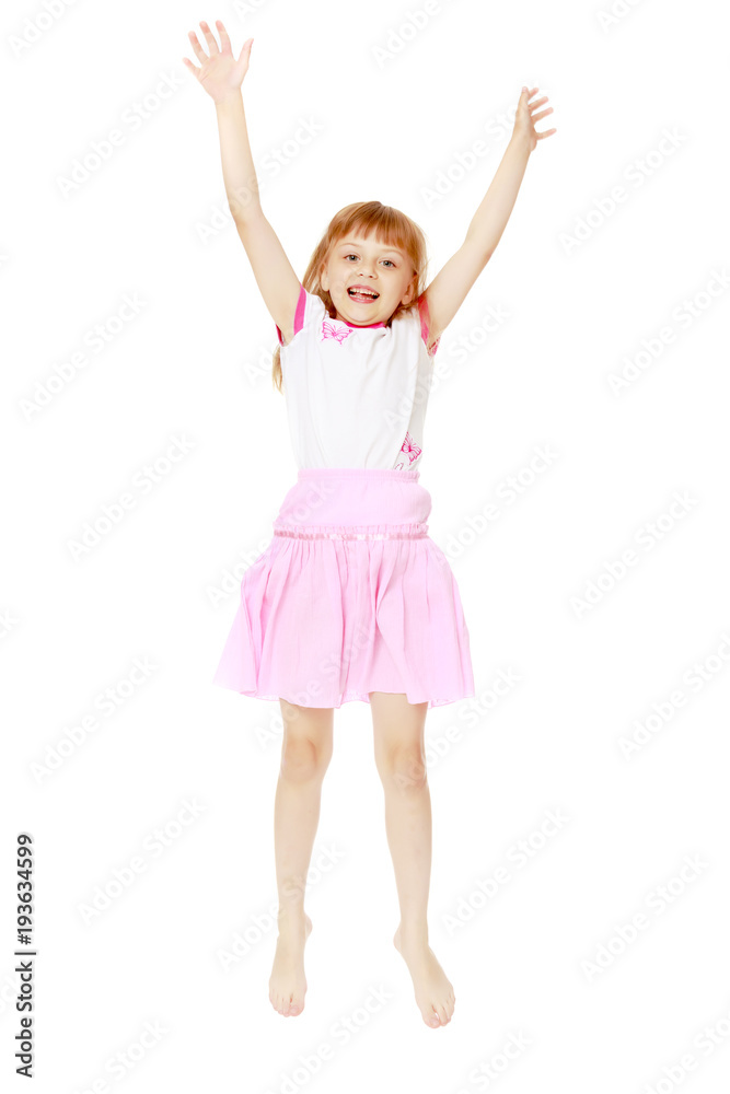 Fototapeta premium Little girl is jumping.