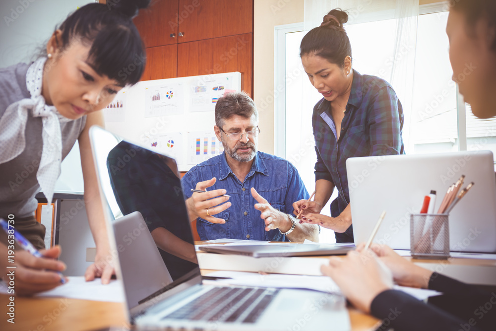 Business team in a meeting For Successful Planners.Business success teamwork concept Business team in a meeting For Successful Planners.Business success teamwork concept