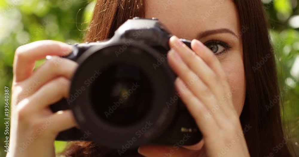 4k, young photographer takes a photo with her digital camera. Slow motion. 4k, young photographer takes a photo with her digital camera. Slow motion.