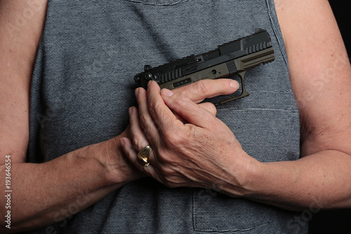 Woman holding a pistol