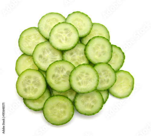 Slice of green cucumber vegetable isolated on white with clipping path