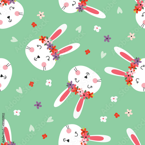 Seamless pattern with cute rabbits and flowers