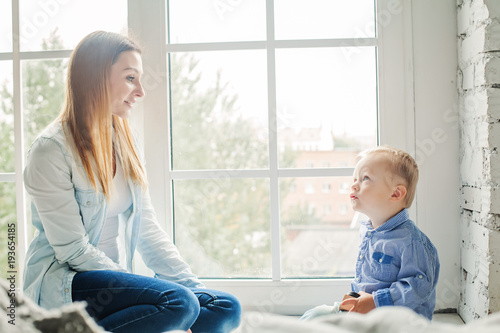 Free Download Funny Sun and her Mom at Home Lifestyle Portrait - GFXLoad