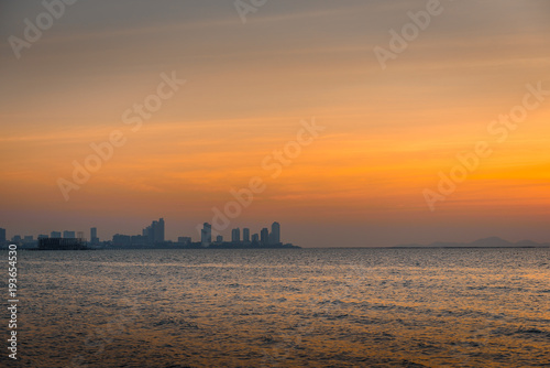 Urban at the sea with sunset sky © arnuphapy