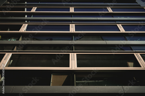 reflections in a facade of a modern building