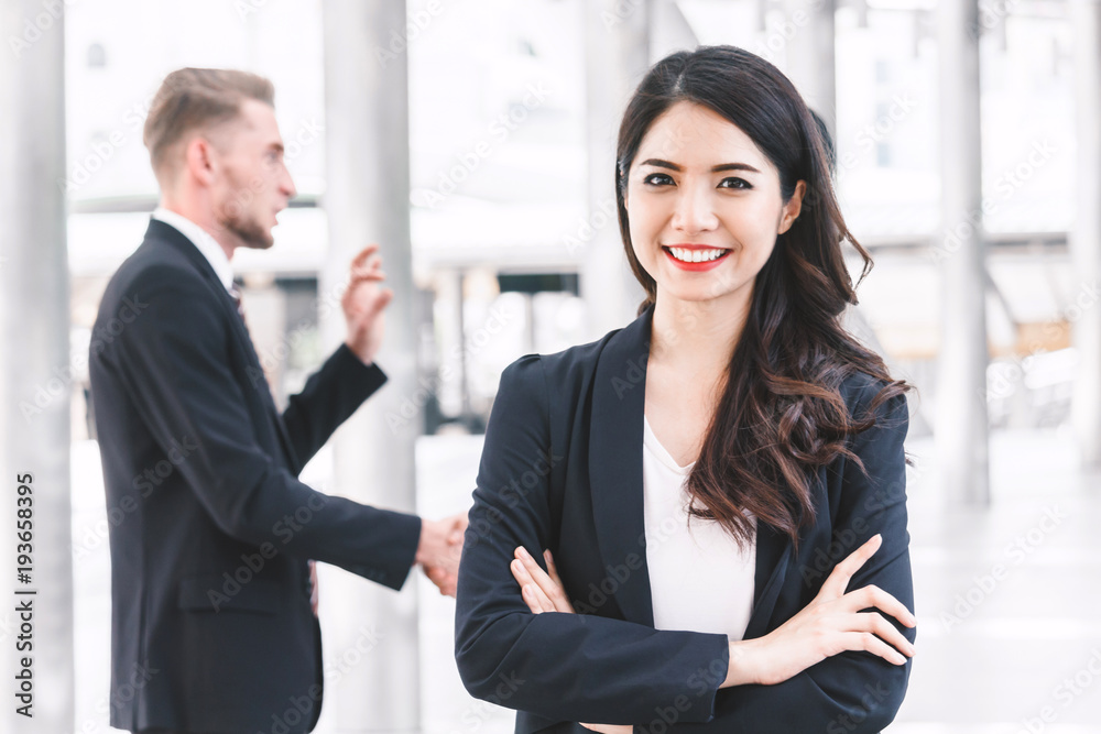 Modern businesswoman crossed hands in office.Business concept Modern businesswoman crossed hands in office.Business concept