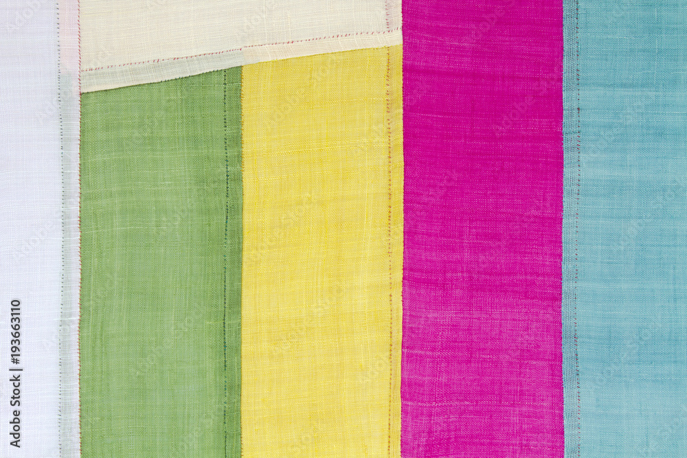 Fototapeta premium Patchwork background of ramie fabric stitched by hand.