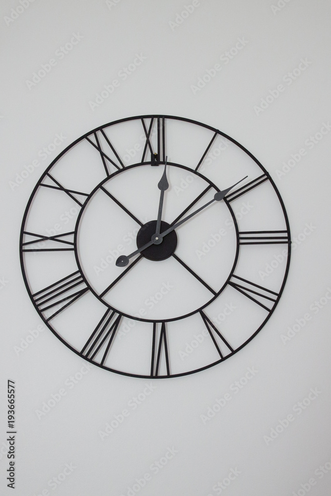 big and old clock with Roman numerals big and old clock with Roman numerals