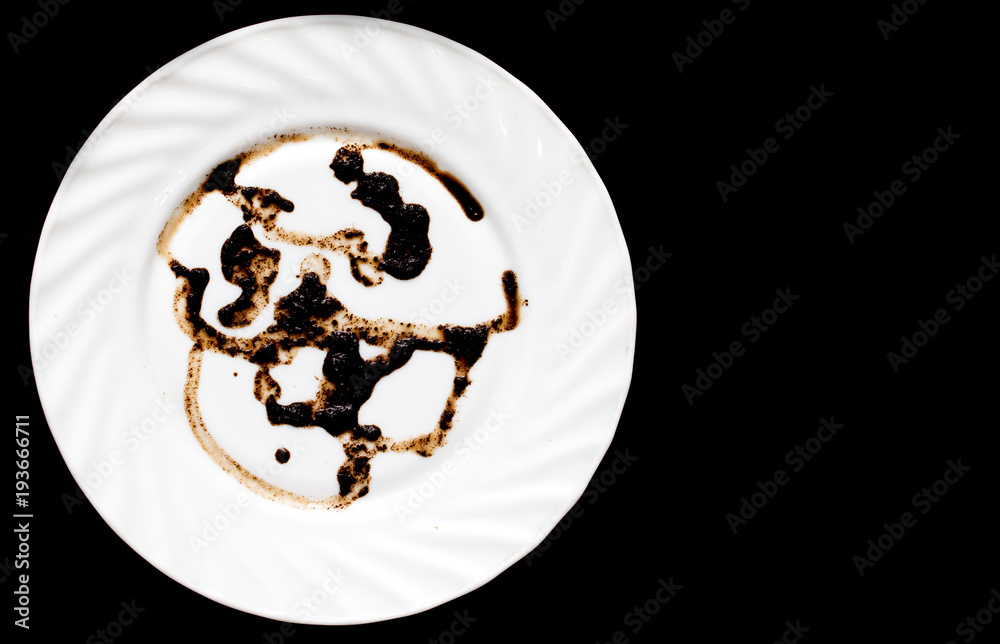 Fototapeta premium A cup of coffee on a black background