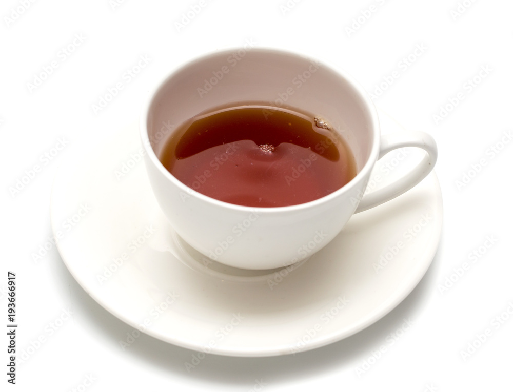 Tea in a cup on a white background Tea in a cup on a white background