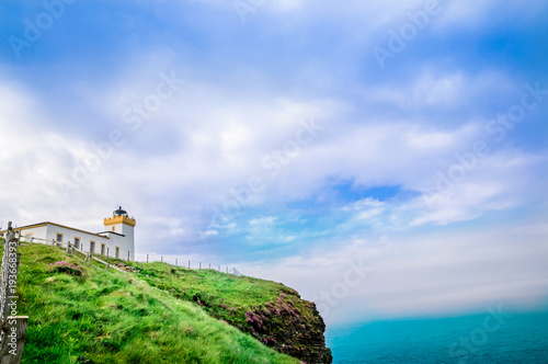 View on lighthouse by Duncansby Head in Scotland
