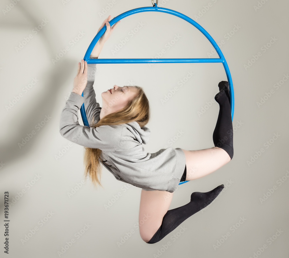 Premium Vector | A girl performs the acrobatic elements in the air ring  vector poster