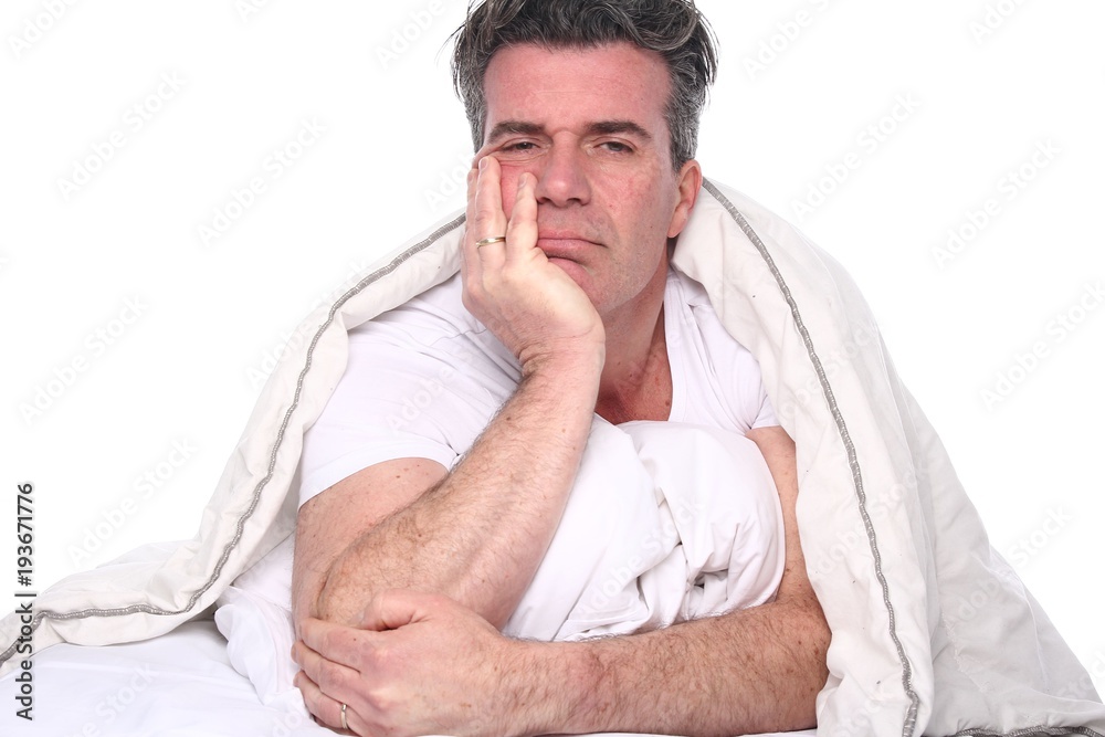 Obraz premium Man in the bedroom