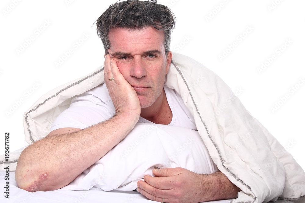 Obraz premium Man in the bedroom