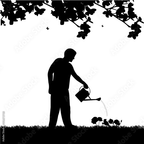 Young gardener watering flowers with a watering can in spring silhouette